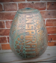 Hollow pot in Sycamore. Pyrography, stain, verdigris, gilding.