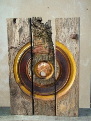 Triptych in reclaimed wood, with ironwork remaining.