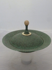 Lidded bowl in Sycamore. Pyrographed, stained and verdigris waxed